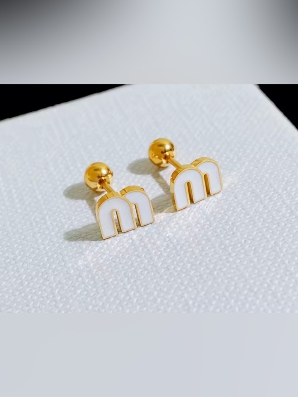 Gold and White 'M' Stud Earrings